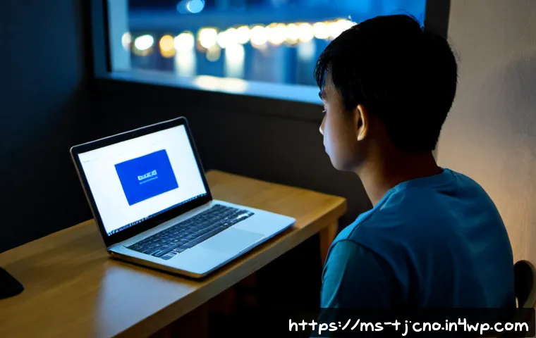 테크노스트레스와 우울증의 관계 - Photorealistic Malaysian young adult sitting alone at a tidy home-office desk in Kuala Lumpur at nig...
